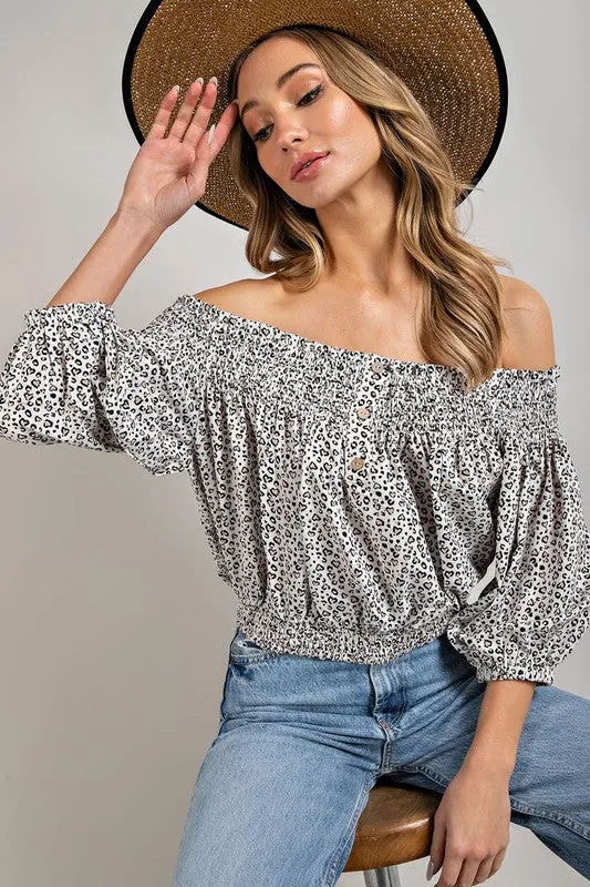 ANIMAL PRINT SMOCKED OFF THE SHOULDER TOP