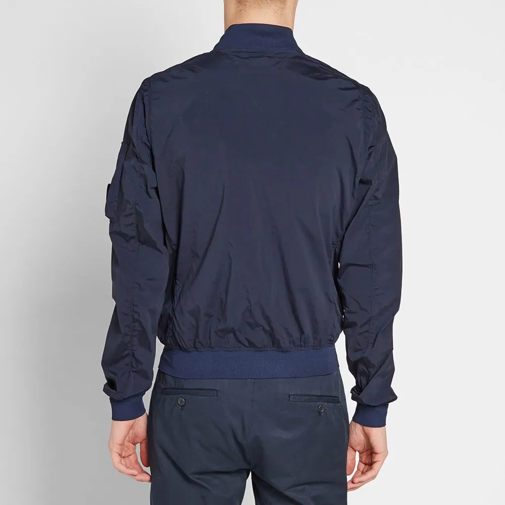 C.P. Company Nycra Stretch Arm Lens Bomber JacketNavy